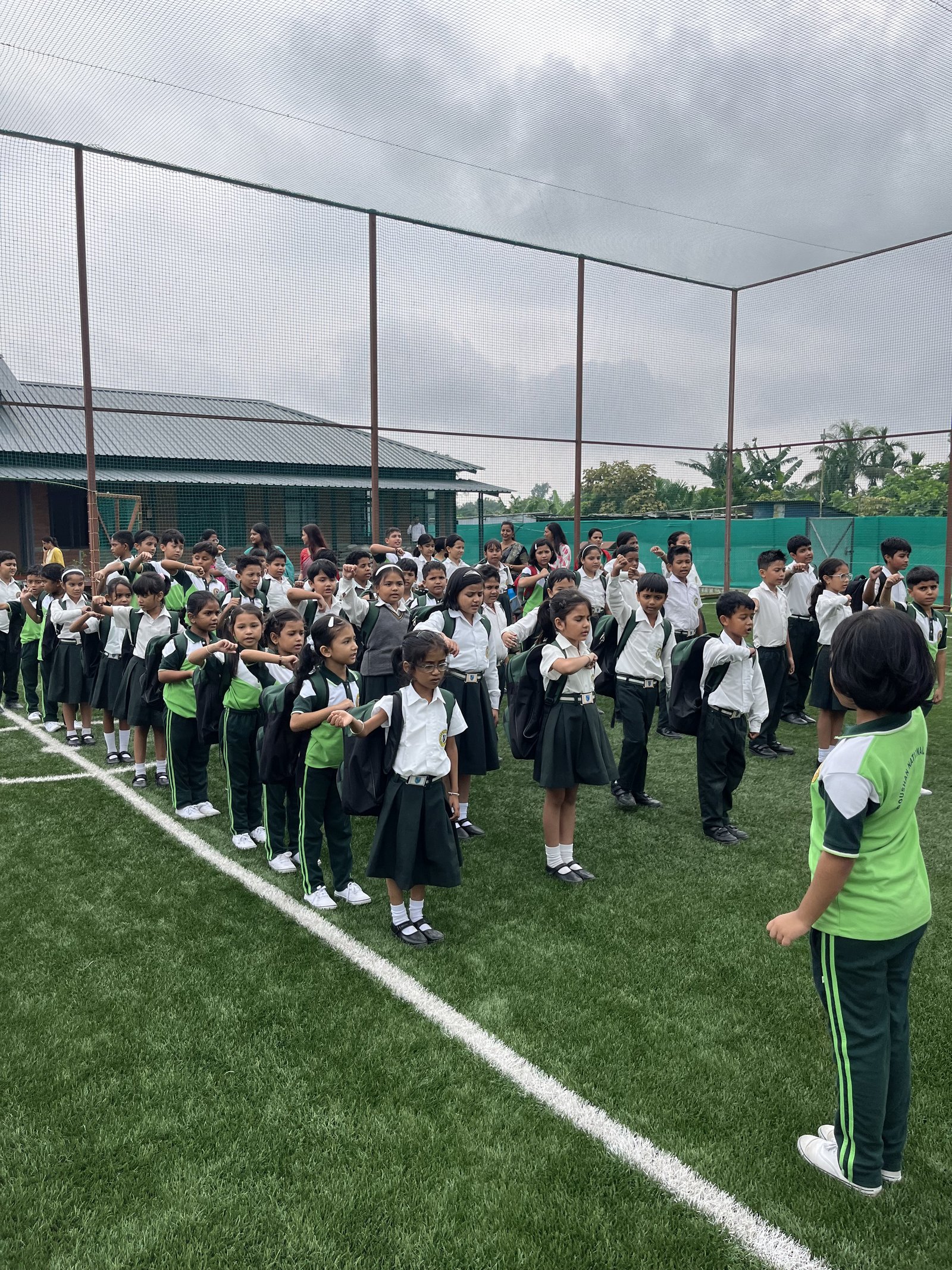 Students using activity-based learning materials at Roushan National School
