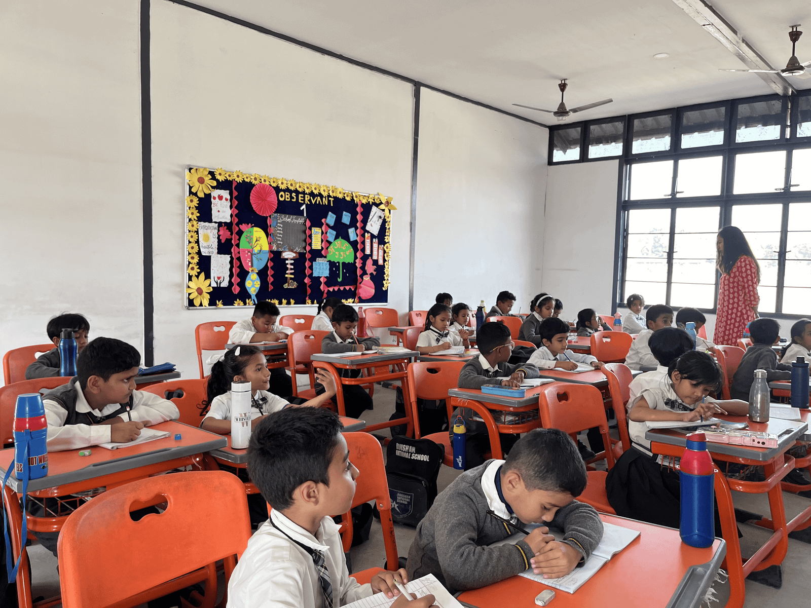Students and learning environment at Roushan National School